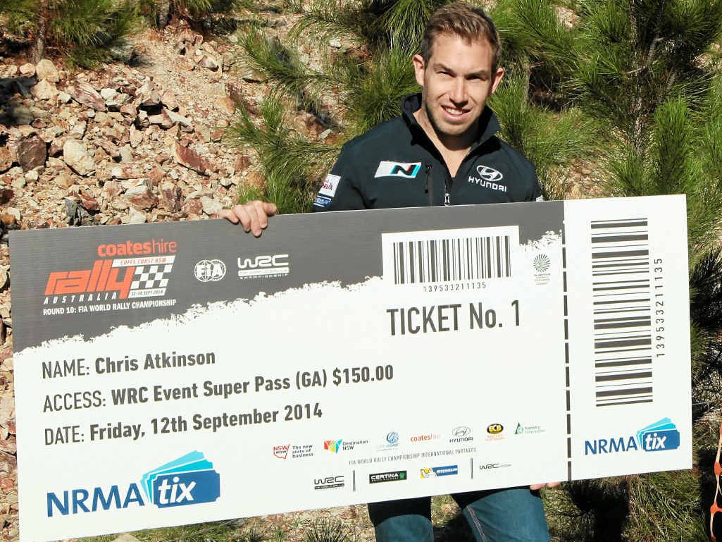 CHEQUE IT OUT: Hyundai WRC star Chris Atkinson grabbed the first ticket to Coates Hire Rally Australia. CHEQUE IT OUT: Hyundai WRC star Chris Atkinson grabbed the first ticket to Coates Hire Rally Australia.